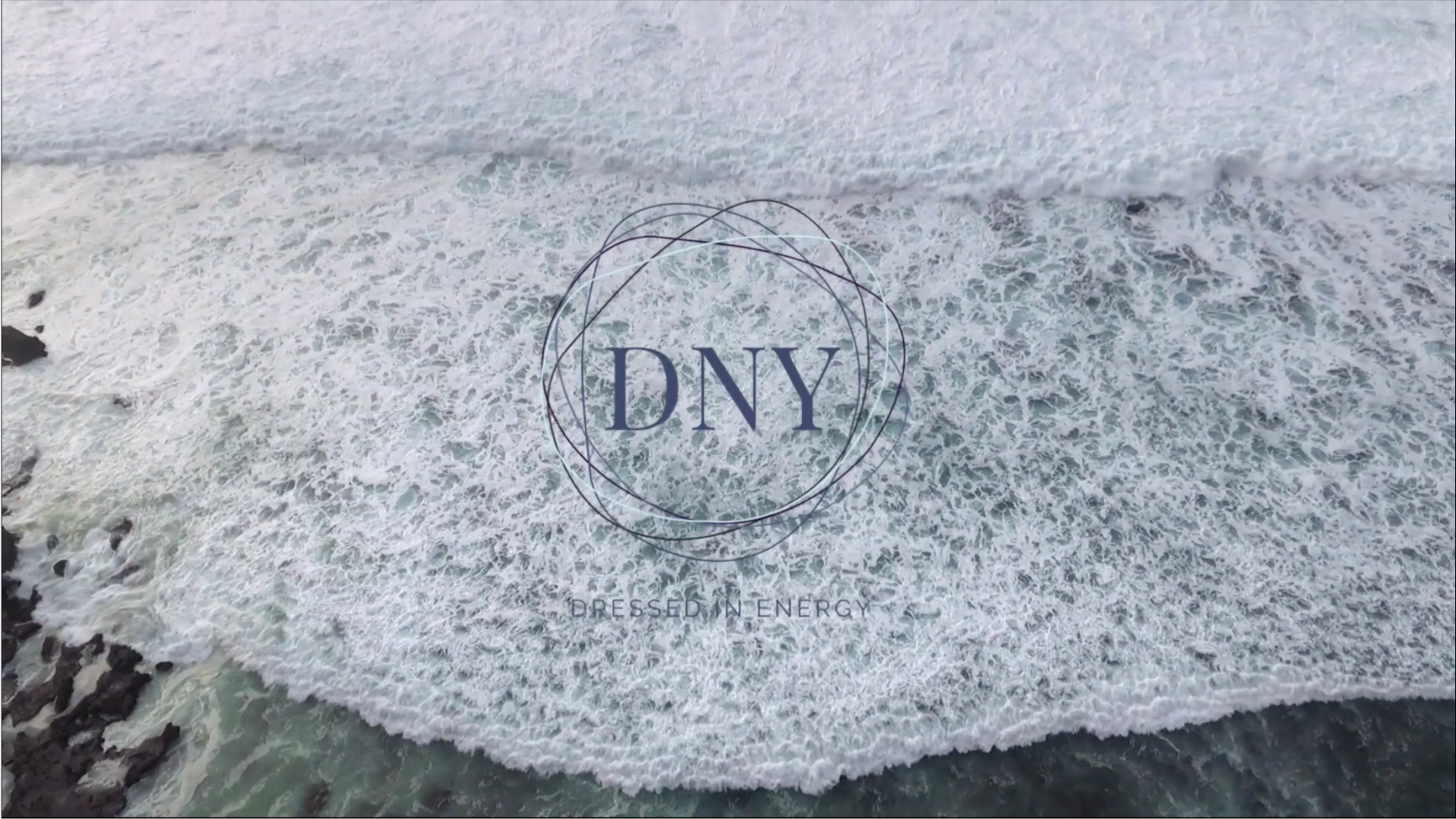 Load video: DNY - Dressed in Energy creates power by transferring energy into clothing and back to yourself